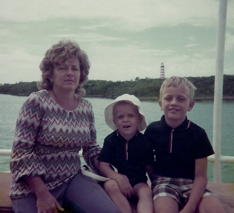 Aboard the Deborah K with my Mom on the left and my brother on the right, passing the  Hope Town lighthouse.   